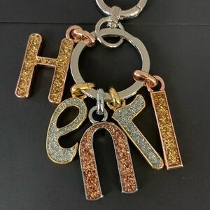 🎉💕💥💥🗣️🗣️CALLING ALL HENRI BENDEL COLLECTORS.. Henri Keyring & Dust bag